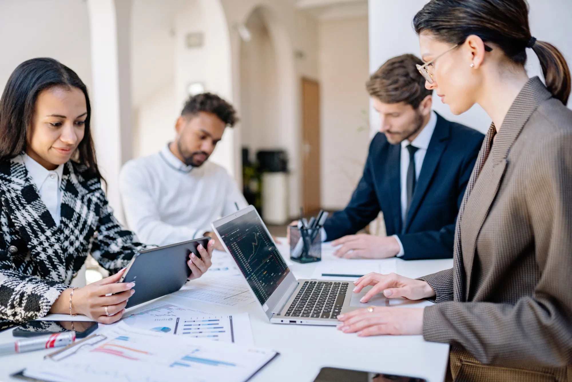 Guild consultants reviewing listing performance and pricing data together